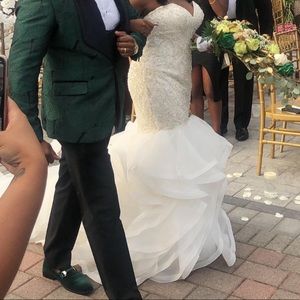 This beautiful wedding gown worn once. Price negotiable.